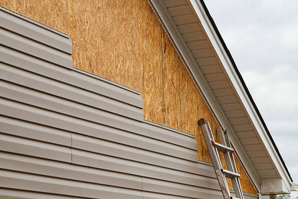 Professional Siding technician working in Piqua, OH